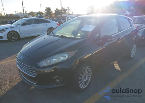 2015 Ford Fiesta Titanium from USA, damaged, VIN 3FADP4FJ7FM110639